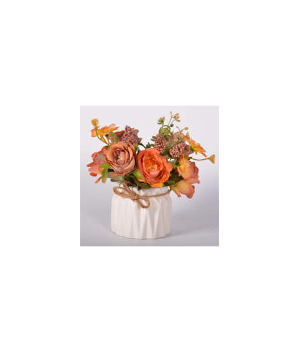 Mixed flowers in geometric pot